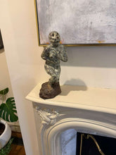 Cargar imagen en el visor de la galería, Statue on a mantelpiece with an abstract textured grey painting in the background