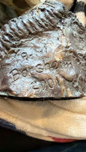 Cargar imagen en el visor de la galería, Detail of a bronze figure sculpture showing the title, artist signature, and the year 2001 etched into the lower part of the artwork