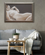 將圖片載入圖庫檢視器 painting of a woman lying on a bed of some sort.  framed original art shown over a grey couch with an off-white blanket draped over the arm and a small table in front of the couch.  Art by Kelly Borsheim