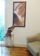 Laden Sie das Bild in den Galerie-Viewer, Ceramic sculpture resting on pedestal and a painting of Icarus show in a living room scene