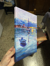 Laden Sie das Bild in den Galerie-Viewer, Hand holding a painting of a harbor scene with a boat, showing the painted canvas wrapping around the sides.