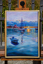 Laden Sie das Bild in den Galerie-Viewer, Painting of a harbor scene with boats on an easel outdoors.