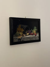 Laden Sie das Bild in den Galerie-Viewer, A framed still life painting of autumn vegetables and leaves, displayed on a plain off-white wall.