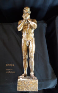 Front view of bronze figure standing male nude with hands over his face.  orders only