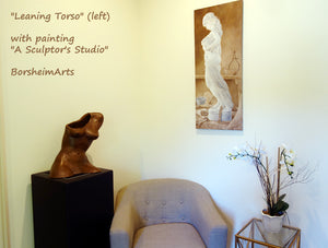 Leaning Torso shown in this music / living room with the painting "A Sculptor's studio" hanging on the facing wall.  Both artworks by Kelly Borsheim