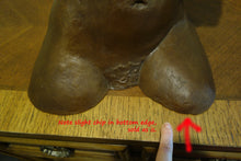 Load image into Gallery viewer, View of the front of the hips, as well as the subtle chipped part at the lower edge of the left leg of the ceramic torso sculpture by Kelly Borsheim
