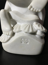 將圖片載入圖庫檢視器 White marble sculpture of a woman's feet over sea shell forms on a black background (detail also includes the artists name and logo)