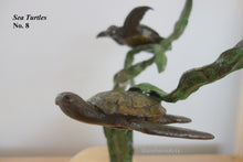 Laden Sie das Bild in den Galerie-Viewer, A close-up of a bronze sculpture depicting two sea turtles on green seaweed, with the text 'Sea Turtles No. 8' in the upper left corner and a watermark 'BorsheimArts' at the bottom right.
