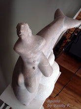 將圖片載入圖庫檢視器 Top view of the sculpture of the naked God Apollo looking skywards as he rides a dolphin.  Stone carving by Vasily Fedorouk