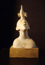 Carica l'immagine nel visualizzatore di Gallery, Ceramic sculpture of a bust with a Trojan Horse on the boy's head as he looks up at it questioningly. Dark background