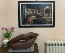 Load image into Gallery viewer, Framed artwork of a cityscape with a sculpture and tulips flowers on a table.