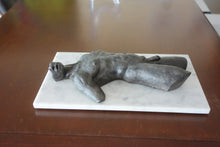 Cargar imagen en el visor de la galería, This images shows the round depth of this high-relief bronze male nude torso sculpture, mounted on marble