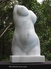 Load image into Gallery viewer, This point of view looks up towards the marble torso of a woman to show the elegance of several viewpoints in this sold work of art by Kelly Borsheim
