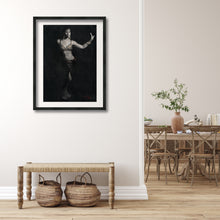 Load image into Gallery viewer, This black and white charcoal drawing with subtle touches of color figure belly dancer looks great in the foyer or entry room.  Seen in the background is a contemporary dining room.
