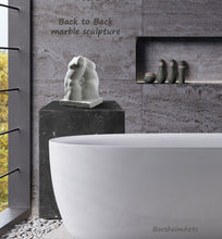 Load image into Gallery viewer, Shown here in an upscale bathroom, the white marble sculpture balances well with the white porcelain bathtub and the grey travertine tile on the walls. Receiving gorgeous side window light on the marble artwork.