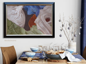 large abstract painting with woman's hand and sea-inspired theme looks great in a dining room with blue decor