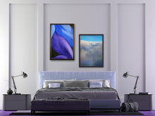 Load image into Gallery viewer, Legs in Purple and Blue is a framed original painting, hanging next to the framed pastel painting print of a cloudscape as seen from a plane.  Both artworks hang over the bachelor pad bedroom.
