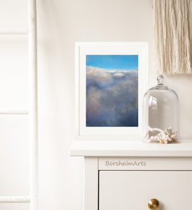 A small print of this pastel painting of clouds as viewed from an airplane make this boho bedroom scene feel larger.