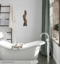 將圖片載入圖庫檢視器 Dancer wall-mounted bronze torso of a woman hangs in an elegant bathroom with an equally curvaceous tub.