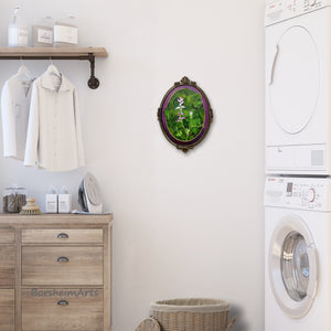 Lovely botanical painting in an oval frame adds an elegant touch to this laundry room.  Fumaria Officinalis by artist Kelly Borsheim, original artwork