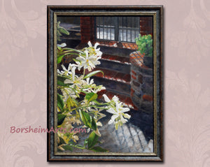 gorgeous backlighting on flowers of Jasmine plant near an outdoor staircase and iron gate, shown in its Italian made wood frame.