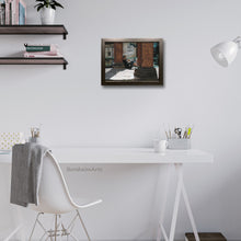 Load image into Gallery viewer, An original framed artwork of a young woman sitting outside in late afternoon sun reading a book enhances this home office and inspires the home owner.

