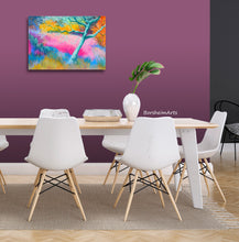 Load image into Gallery viewer, This mockup actually shows the pastel art of a leaning olive tree in Tuscany as a print on metal.  Thus, it hangs on the wall without a frame in this dining room with a light burgundy accept wall, which really makes the artwork pop.
