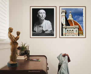 Bronze sculpture Together and Alone sits atop the desk in a home office, while a drawing print of charcoal and pastel drawing of Niccolo' da Uzzano, businessman for the ruling Medici family of bankers, while beside that is a digital download photograph of the Duomo Cathedral in Florence, Italy.  Who would not be inspired?