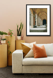 The repeating arches of the Palazzo Pitti in Florence, Italy, looks great with warm colored walls and home decor. Pastel and some charcoal drawing of Italian architecture with long afternoon sunlight and shadows creating repeating arches on the ground as well.