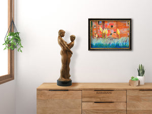 This mock-up bedroom scene shows the pastel artwork as if might be framed hanging on the wall in this neutral, minimalist decor room.  On top of the dresser is the bronze figure sculpture "Together and Alone," also by artist Kelly Borsheim