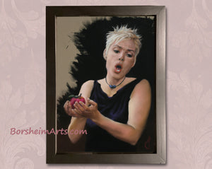 Framed pastel portrait of blonde opera singer woman holding a red apple, reminding us of the story of Eve and her temptation