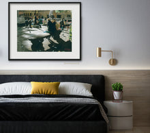 Load image into Gallery viewer, Add this shadowy image of late afternoon sun in Piazza Santo Sprito in Florence, Italy, here framed and matted and hung on the wall over a bed.  Cozy!
