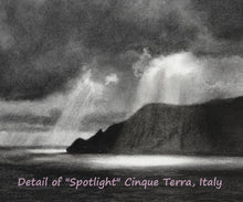 Load image into Gallery viewer, Detail of Spotlight, an original charcoal drawing of the rugged Italian coastline before a storm.  The dark clouds part just enough to allow sun rays to shine down from the heavens and into the sea.  Art by Kelly Borsheim
