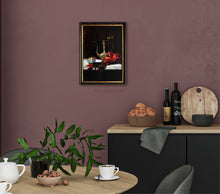 Carica l'immagine nel visualizzatore di Gallery, this still life oil painting of a marble slab shelf supporting a lovely draped red, orange, and black scarf, with a small colored glass bowl with a lit tealight inside and a metal vase type thing from Morocco or maybe Turkey.  shown here in a modern but warm kitchen scene.