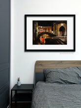 Cargar imagen en el visor de la galería, original oil painting Venezia Fish Market at Night by K. Borsheim shown here in mockup of simple bedroom with art above bed