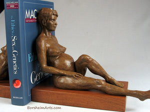 Peaceful modest pose of the seated nude pregnante young woman with short hair, Expecting Twins bronze and wood bookends.  Great gift idea for maternity themes, as well as gifts for twins, especially twin mothers or twin babies.  Functional sculpture art by Kelly Borsheim