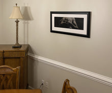 Load image into Gallery viewer, Add elegance to any room with Entwined, framed charcoal drawing of man with interlaced fingers, as it might look in a dining room as home decor art