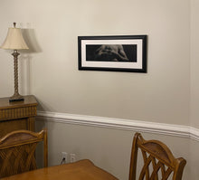 Load image into Gallery viewer, Add elegance to any room with Entwined, framed charcoal drawing of man with interlaced fingers, as it might look in a dining room as home decor art