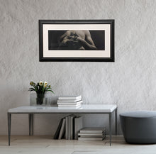 Load image into Gallery viewer, Entwined, framed charcoal drawing of man with interlaced fingers, as it might look in a home