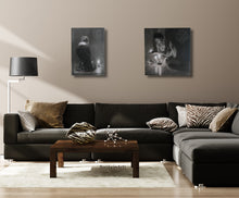 Load image into Gallery viewer, Zebra Lips makes a cool tabletop sculpture, its black and white zebra marble creating a balance with the zebra pillows on the dark grey couch; The diptich Luminosity is shown above on the wall.