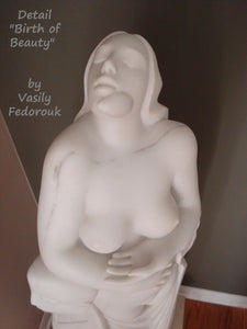 Close-up and "bird's eye" view of the face of the woman as she closes her eyes while head tilted back, an awakening in birth perhaps?  Marble veining can be seen in this original stone carving that will enhance your art collection and add beauty to your home.