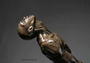 Detail in profile of the black man leaning back and screaming intensely with effort to resist or rebel from what is holding him down,  Against the Dying of the Light - Rage Rage bronze sculpture