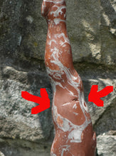 Load image into Gallery viewer, Break in the marble during carving, glued by the artist, chips in stone Rojo Balboa Spanish Marble