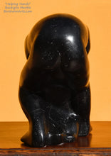 Load image into Gallery viewer, Back view of man's body black Marquina marble Helping Hands figure sculpture