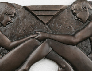 Detail of Bronze tradition 8th anniversary gift, sculpture titled Infinity bronze bas-relief sculpture Number 8