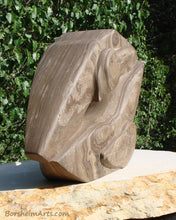 Load image into Gallery viewer, Side view of layers in Marble Pelican Lips Marble Sculpture like Petrified Wood
