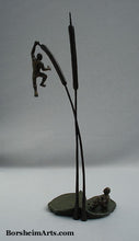Load image into Gallery viewer, Whole view of tabletop sculpture statues of two men with lily pad and two cattails.  Life is so uncertain!  Thanks Lyle Lovett for those words. Artist Kelly Borsheim bronze art