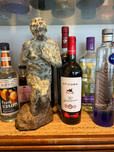 Cargar imagen en el visor de la galería, Alcohol bottles including Epicuro and a statue on a shelf beside a bronze figure sculpture looking up asking "why"
