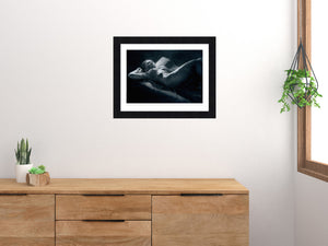 Hindsight print is hung in this simple bedroom scene above the dresser. Female nude figure lies in bed, unable to sleep.