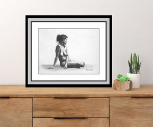 sample image of fine art figure drawing framed and resting on a dresser top, female art nude drawing from live model